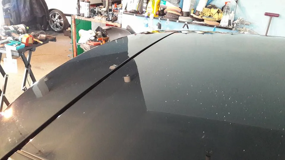 Posle: Crni auto (grad)